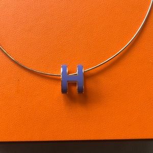 Caged H Hermès necklace.
